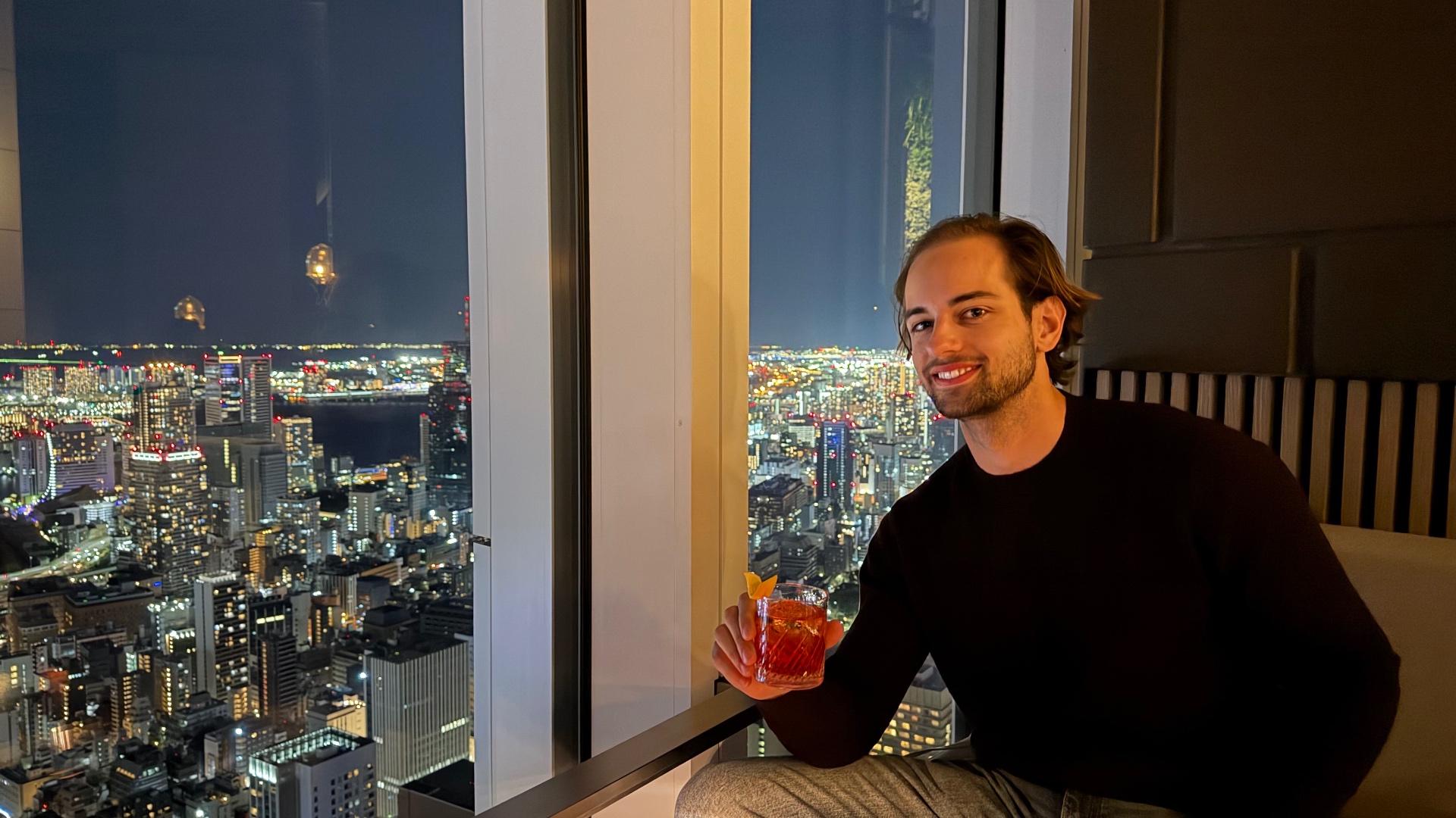 Founder of CrowdFreeViews at a Tokyo skyline bar