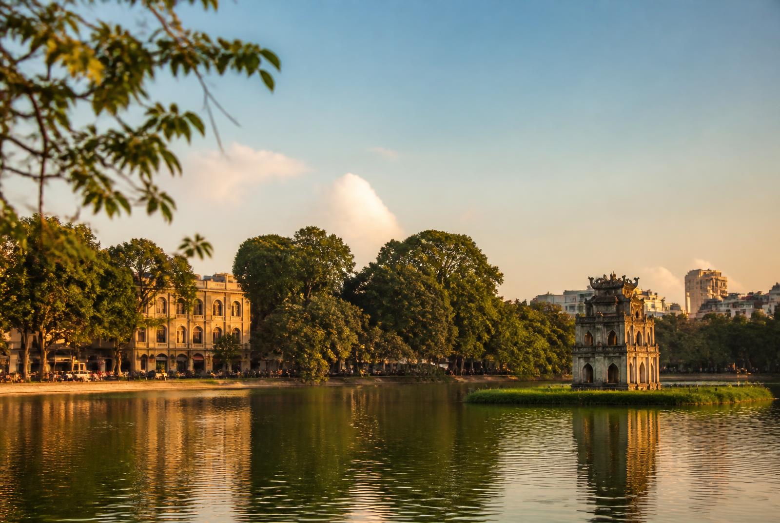 Hoan Kiem Lake and Turtle Tower in Hanoi at golden hour