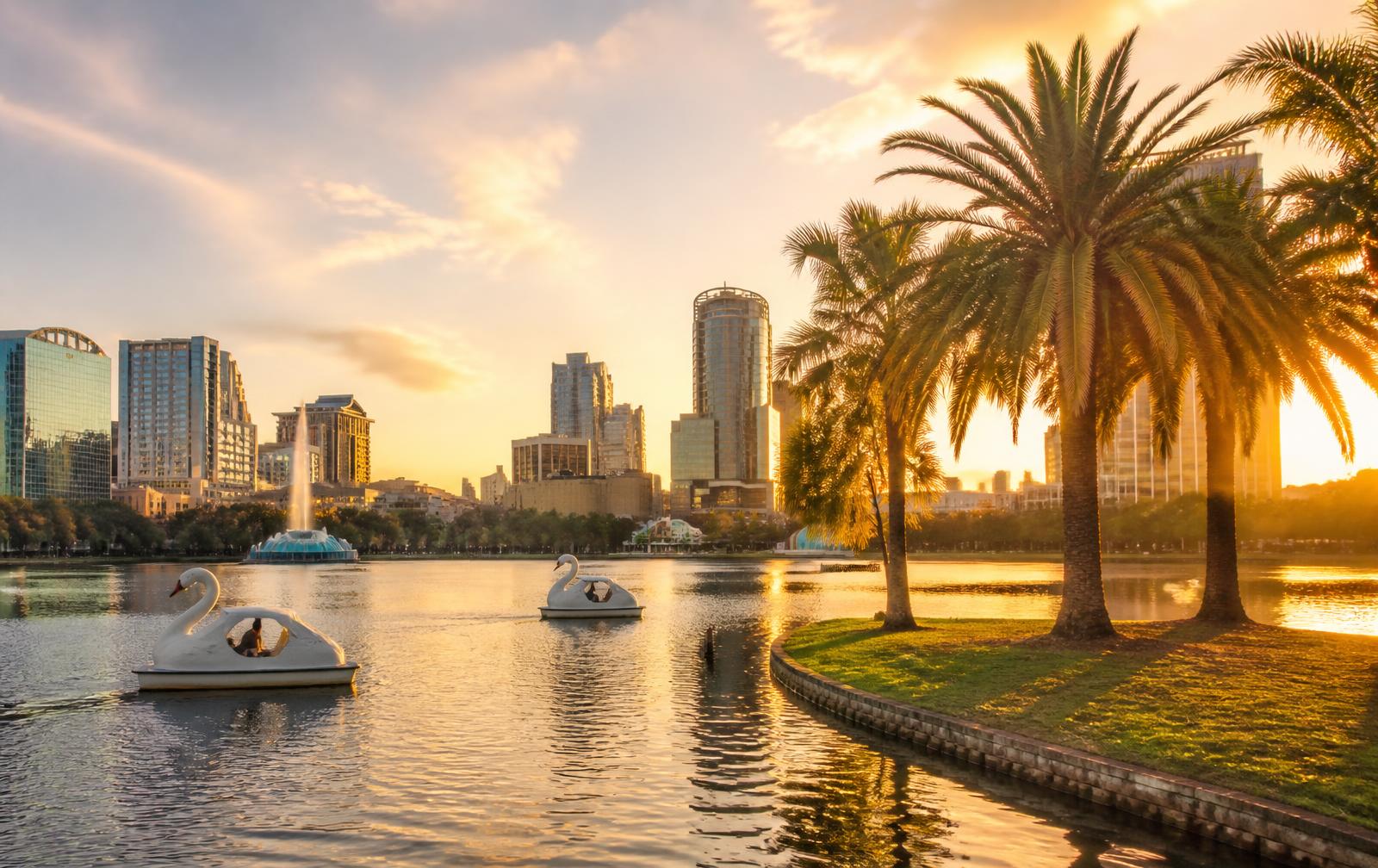 Orlando skyline across Lake Eola at golden hour